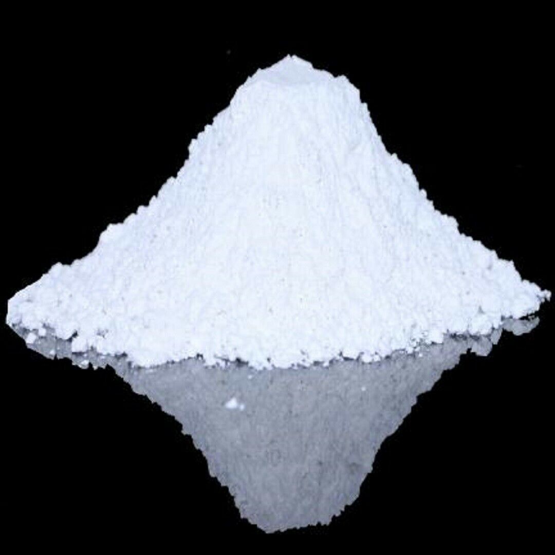 A pile of white powder on a black background.