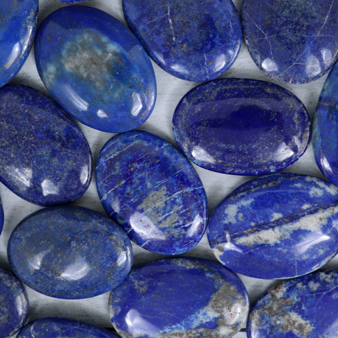 A close up of a group of lapis stones.