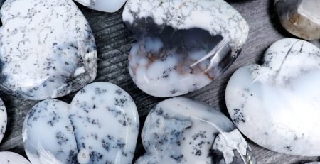 A group of white and gray heart shaped stones.