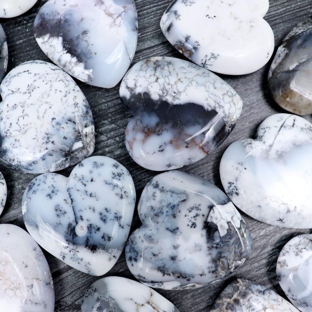 A group of white and gray heart shaped stones.