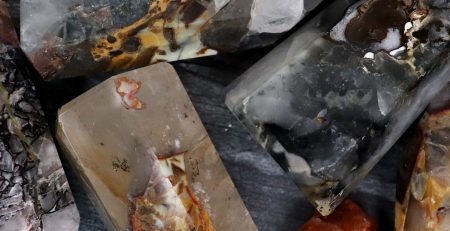 A group of rocks and minerals on a table.