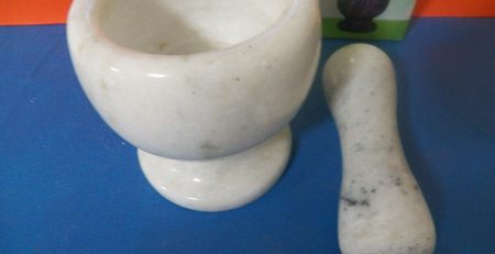 White marble mortar and pestle.