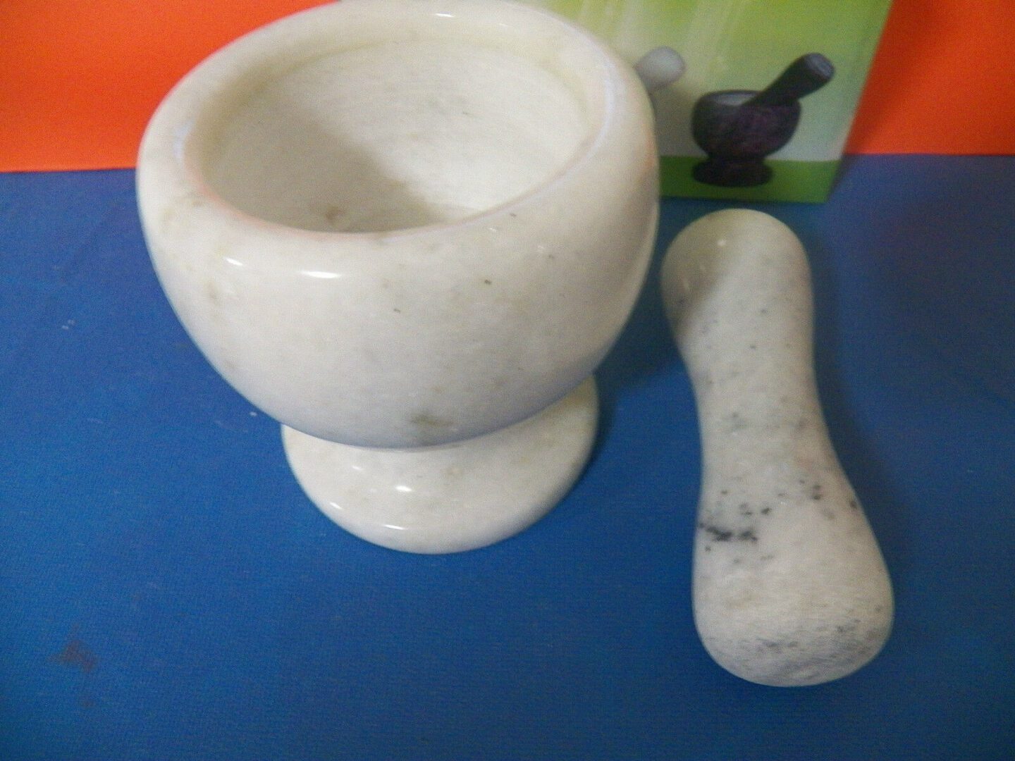 White marble mortar and pestle.