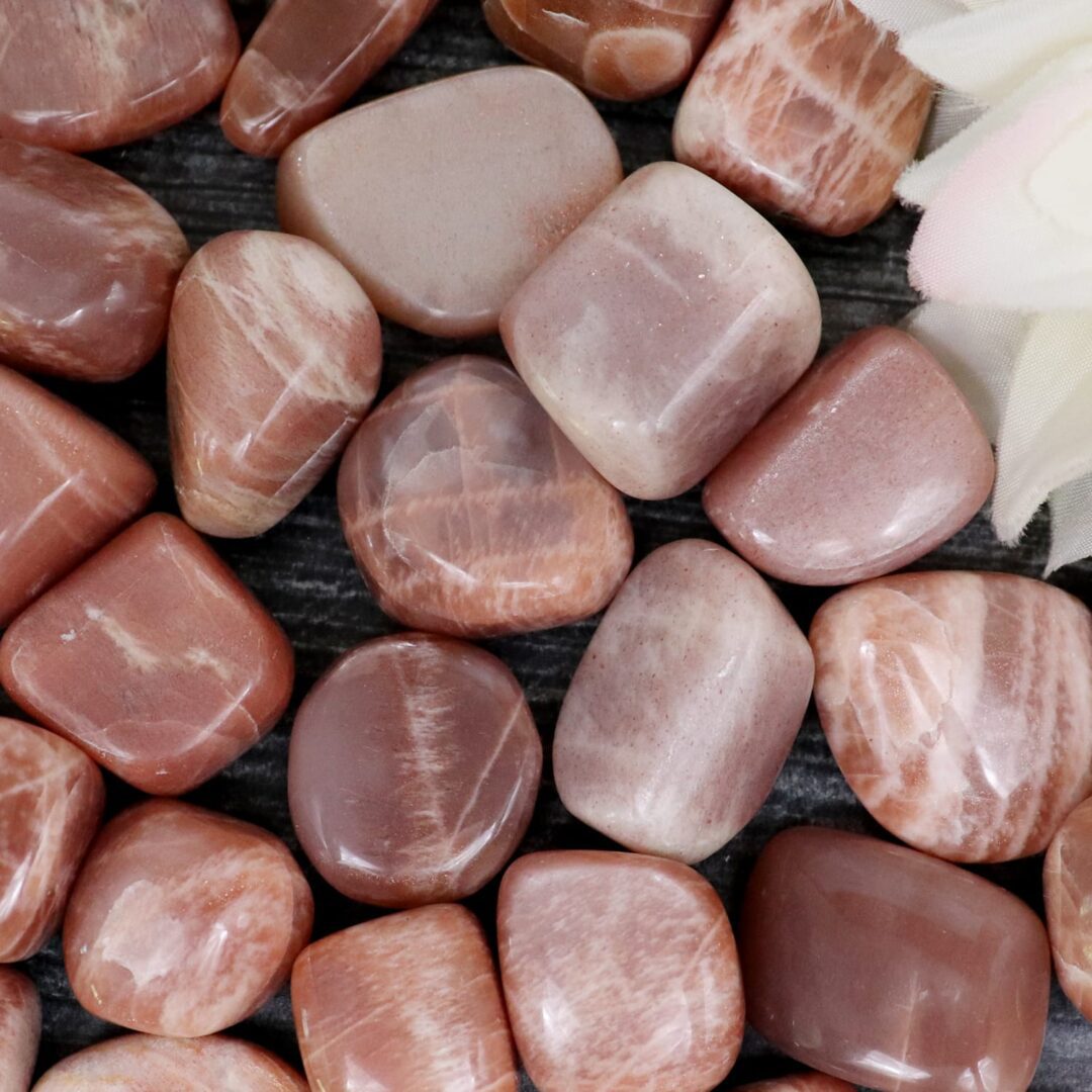 A pile of pink and brown stones on a table.