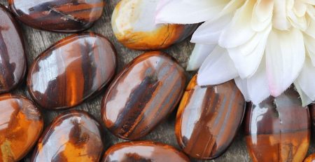 Tiger eye stones with a flower in the middle.