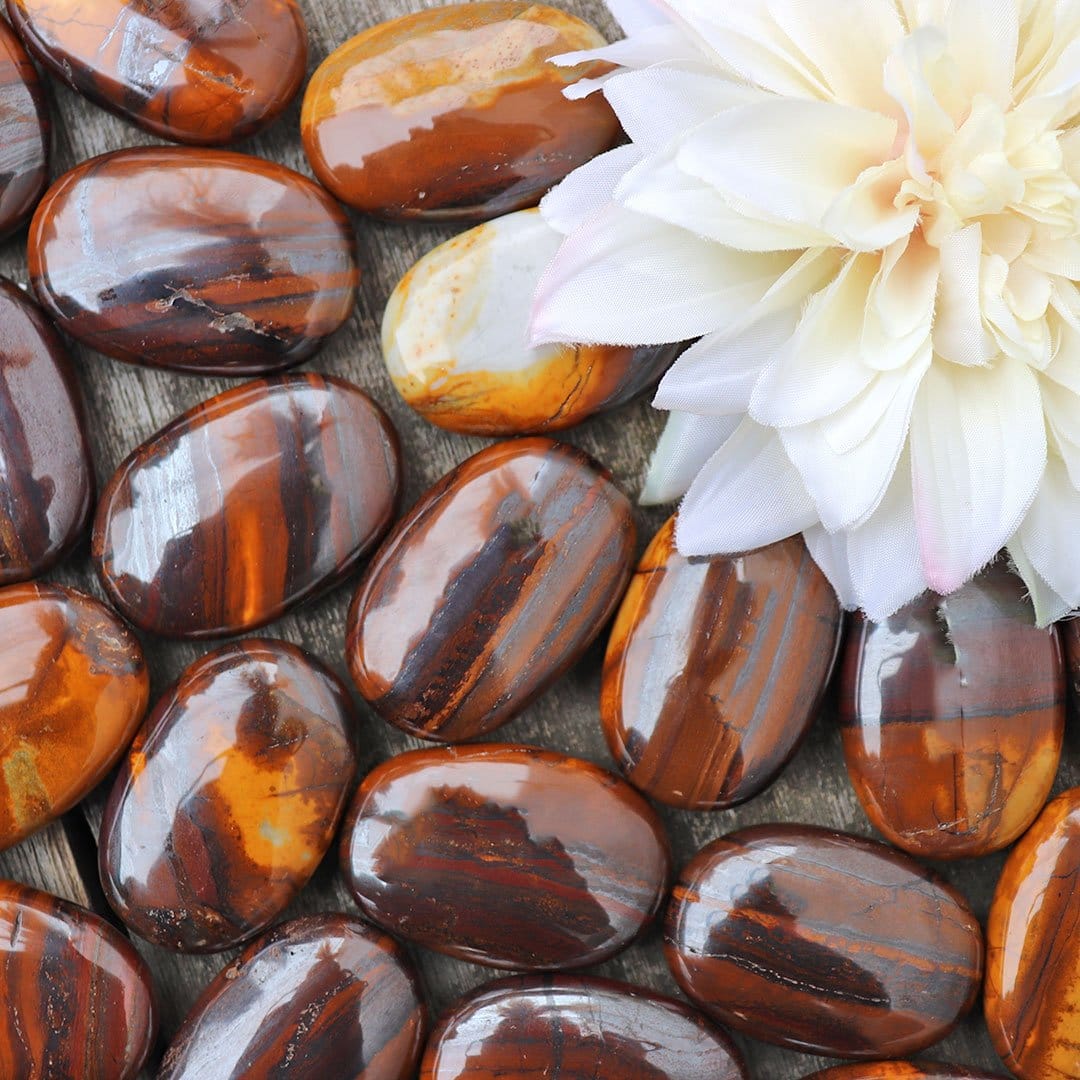 Tiger eye stones with a flower in the middle.