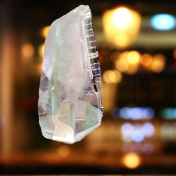 Clear crystal point hanging in store