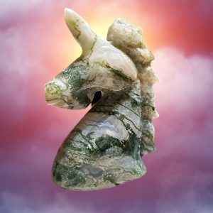 Green and white stone unicorn figurine.