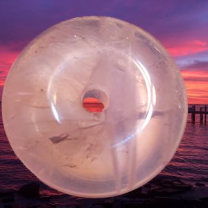 White crystal donut with sunset view.