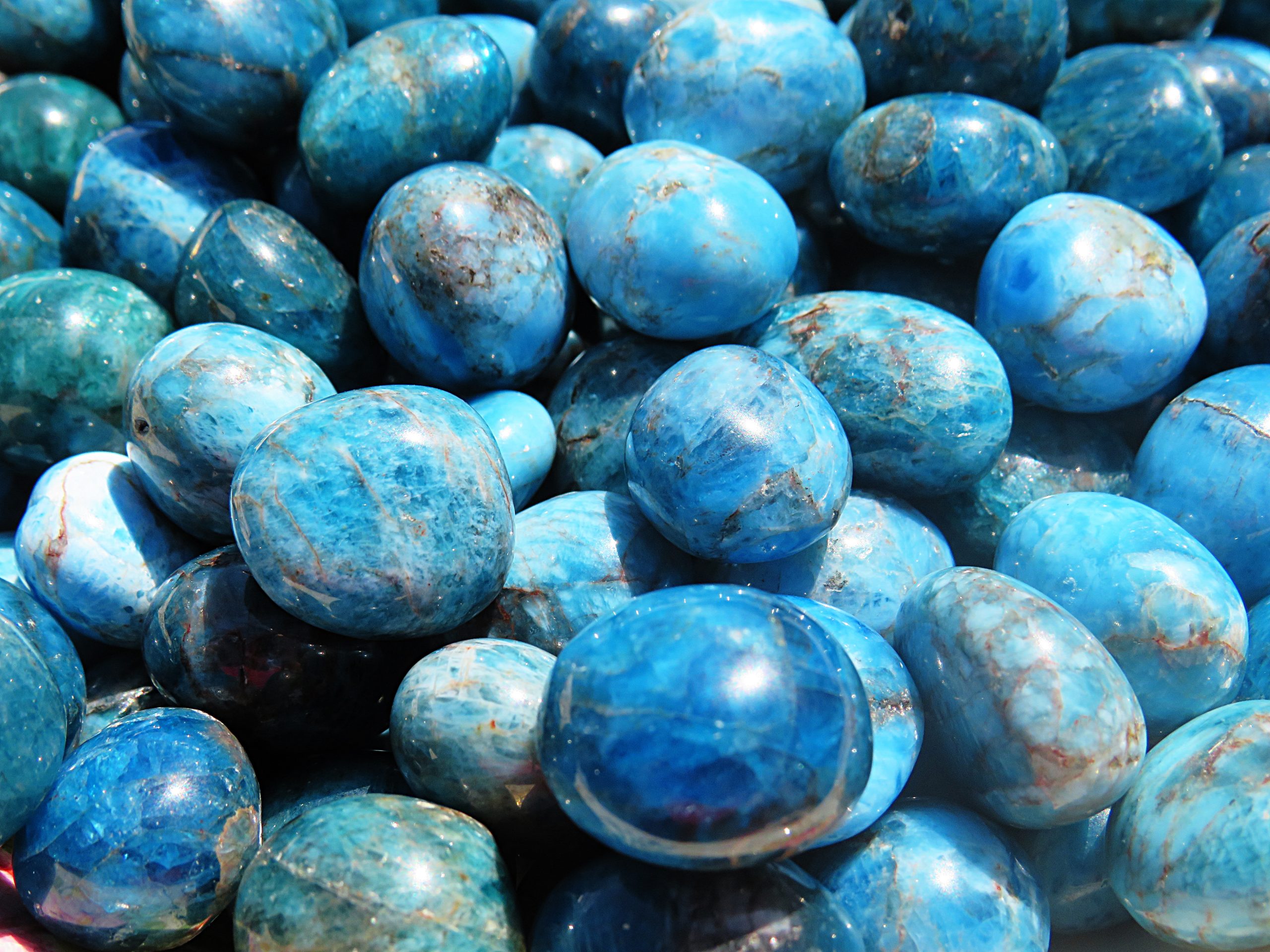 A pile of blue apatite gemstones.