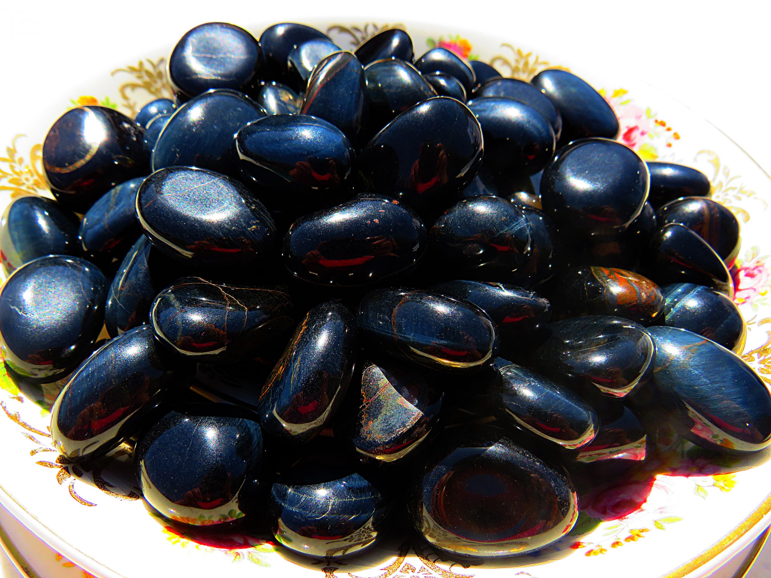 A pile of shiny black stones.