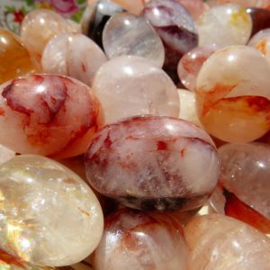 A pile of smooth, red and white stones.