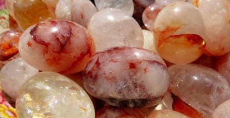 A pile of smooth, red and white stones.