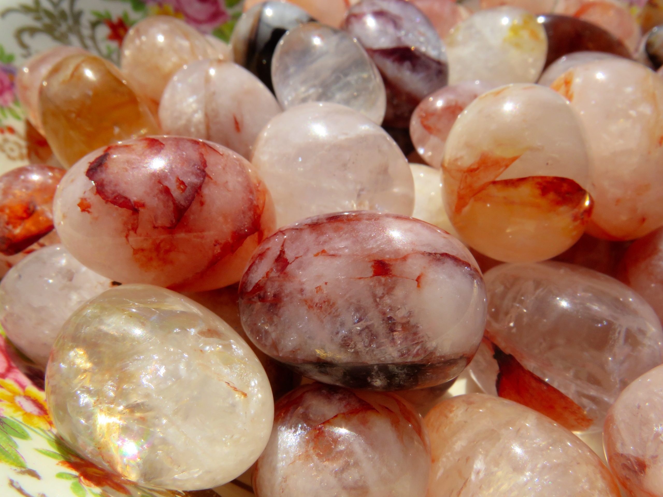 A pile of smooth, red and white stones.