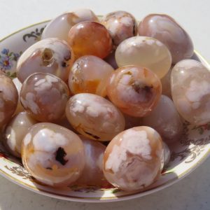 A bowl of agate tumbled stones.