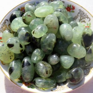 Green and black gemstone tumbled stones.