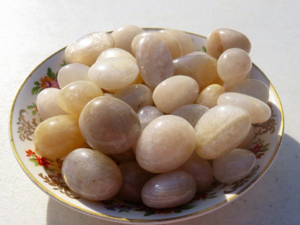 Bowl of smooth, translucent white stones.