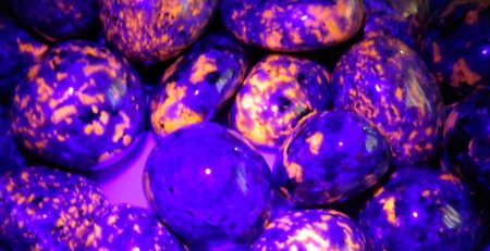 Purple and orange glowing rocks.