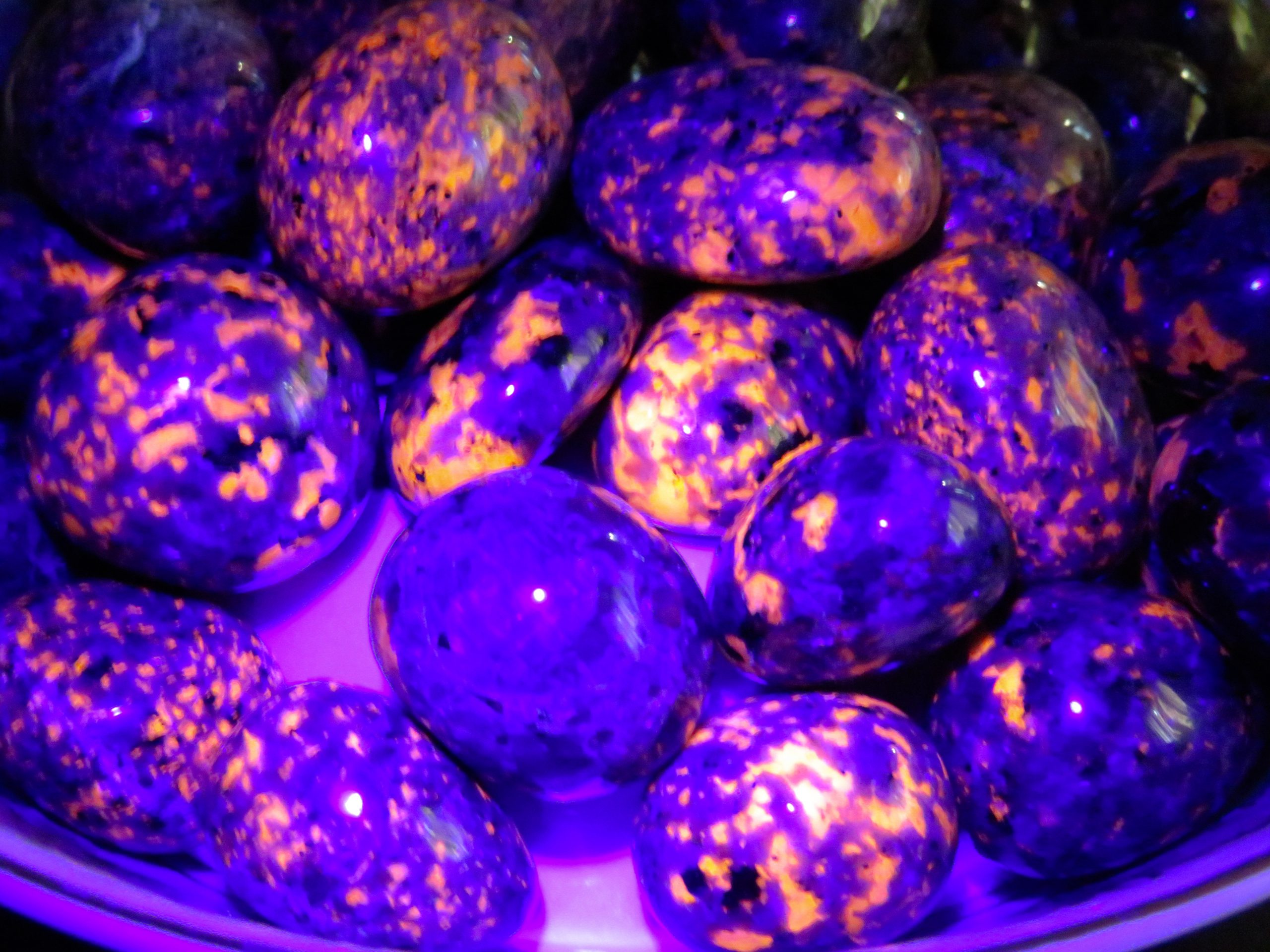 Purple and orange glowing rocks.