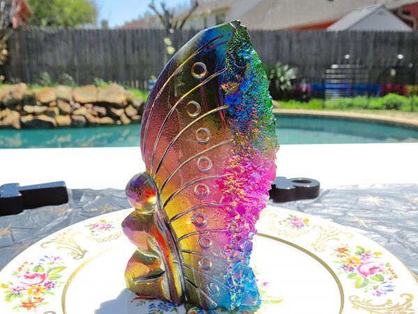 Rainbow iridescent butterfly crystal sculpture.