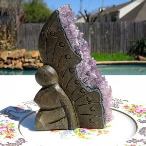 Amethyst crystal carved into a butterfly.