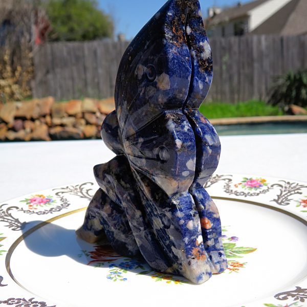 Blue and white gemstone butterfly sculpture.
