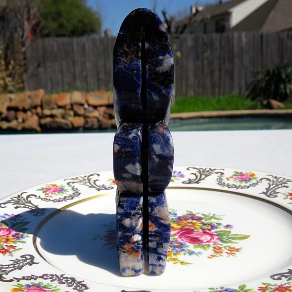 Blue and white carved stone sculpture.