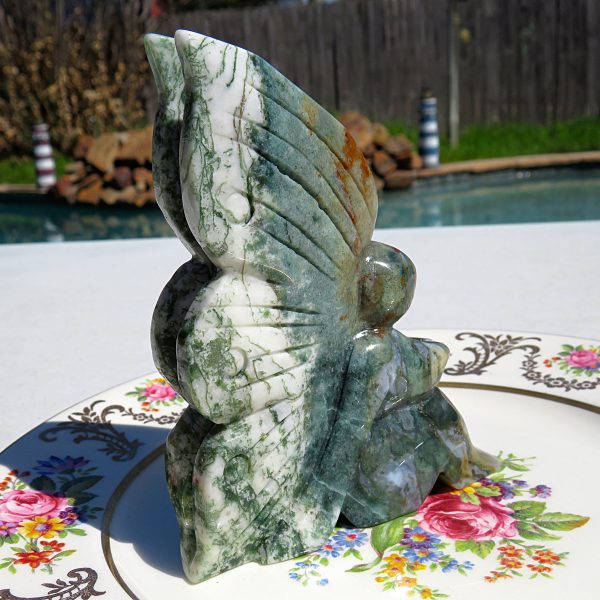 Green and white agate butterfly sculpture.