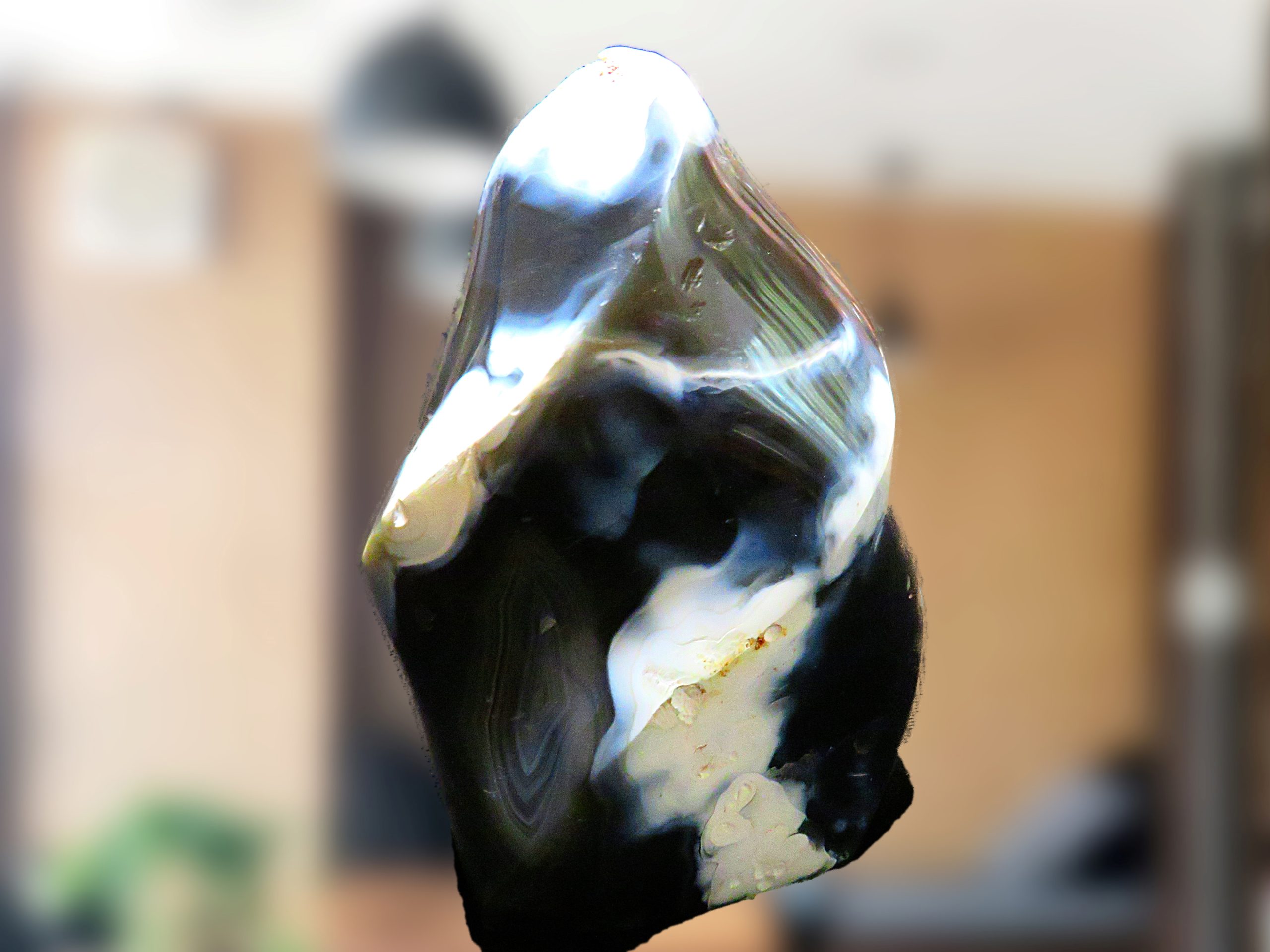 A piece of agate sitting on a table in a living room.