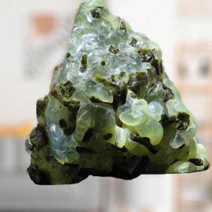 Green and clear crystalline rock formation.