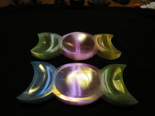 Two iridescent triple moon bowls.