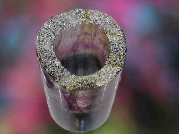 Close-up of a purple and green crystal.