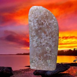 White and gray agate stone at sunset.