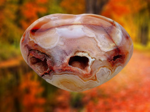 Brown and white banded agate stone.