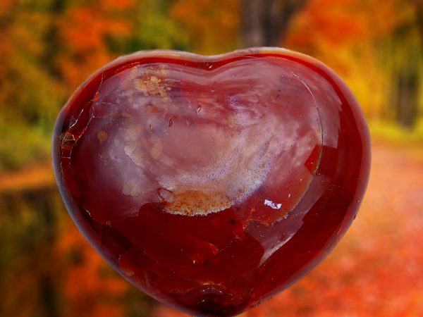 Red heart-shaped carnelian gemstone.