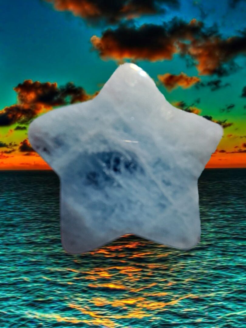 A star in the ocean at sunset.